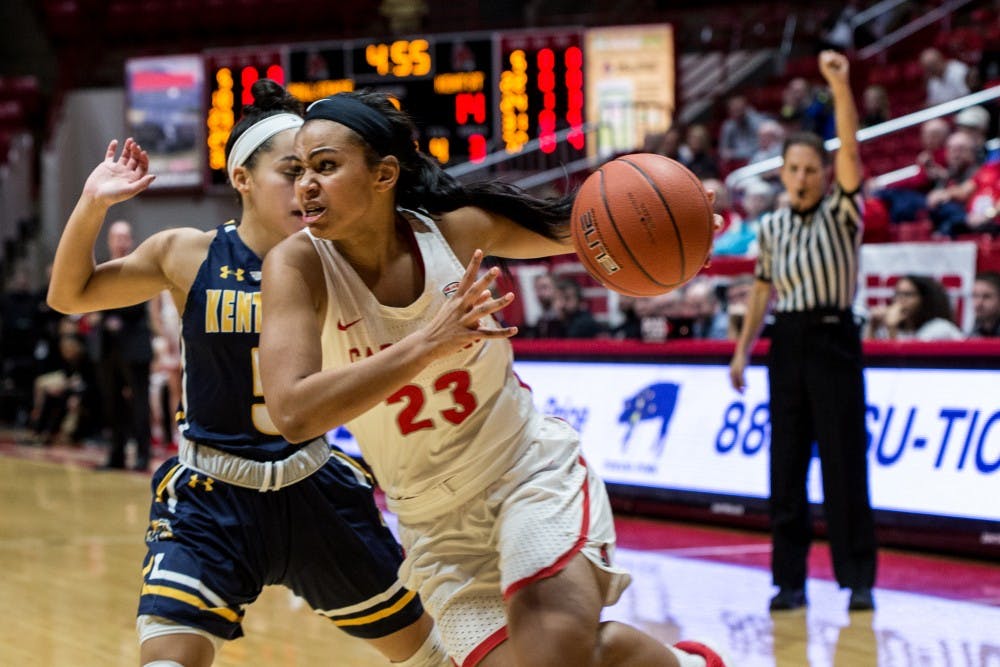 <p>Ball State guard Gabby Smith charges to the basket where she drew a foul from Kent State guard Mariah Modkins in John E. Worthen Arena Jan. 23, 2019. Ball State defeated Kent State to break their losing streak and set their overall record for the season 7-11.<strong> Eric Pritchett,DN</strong></p>