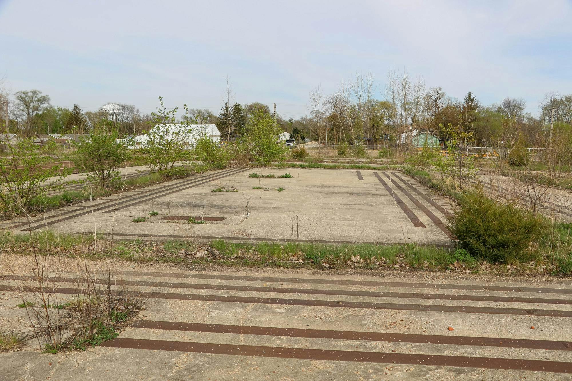 Metal slates give a clue as to the former layout of the Chevy factory in Muncie. After the building was closed in 2006, many of the machines were ripped out prior to demolition.