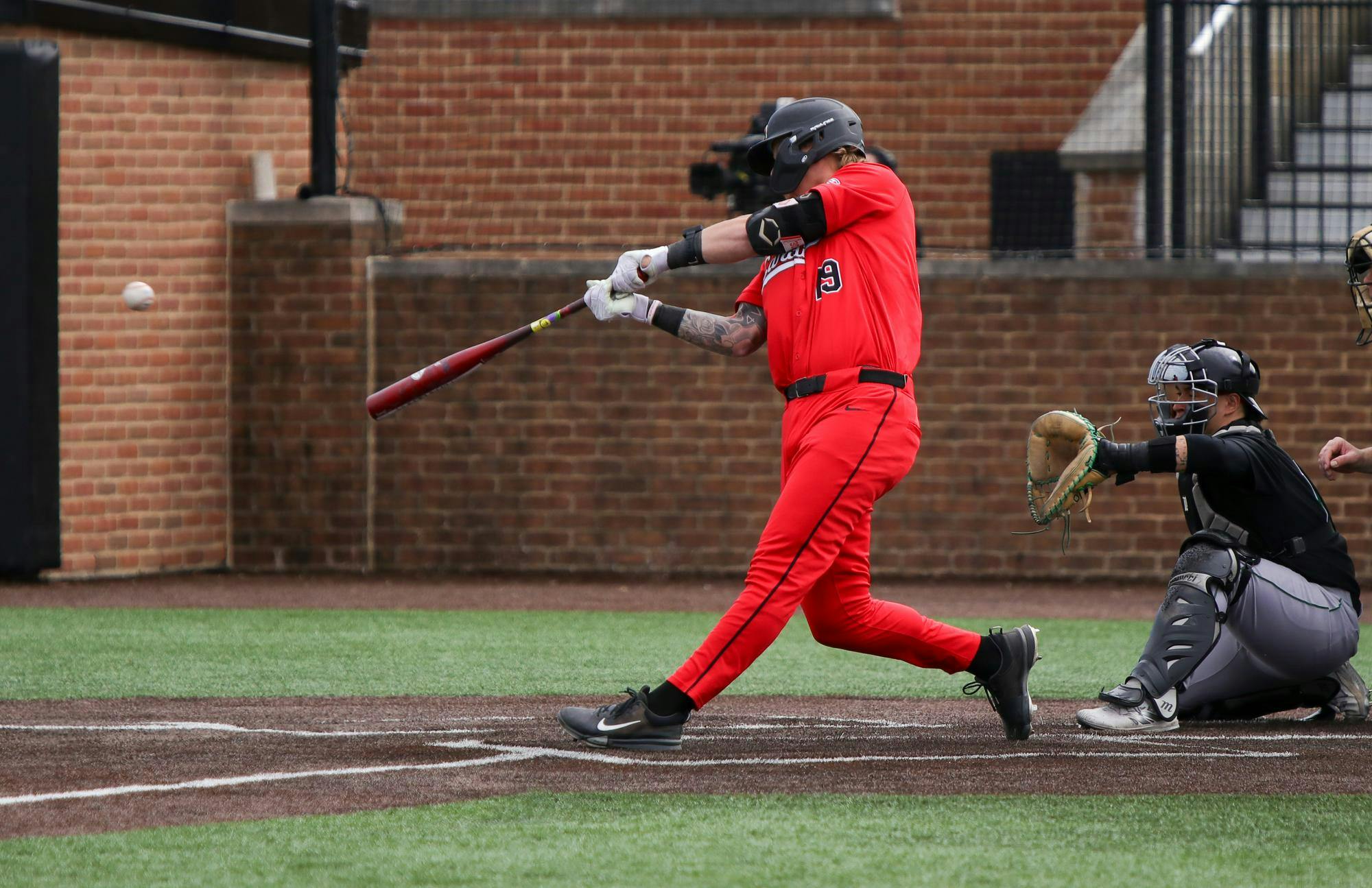 Ball State junior first baseman Jacob Gillis hits the ball March 29 at Shebek Stadium. Gillis has scored a season high of 3 runs. Adam Jones, DN