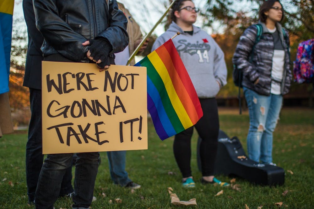 Students and members of the community joined together on the University Green on Nov. 9 for a peaceful protest after the election of Donald Trump. Reagan Allen // DN