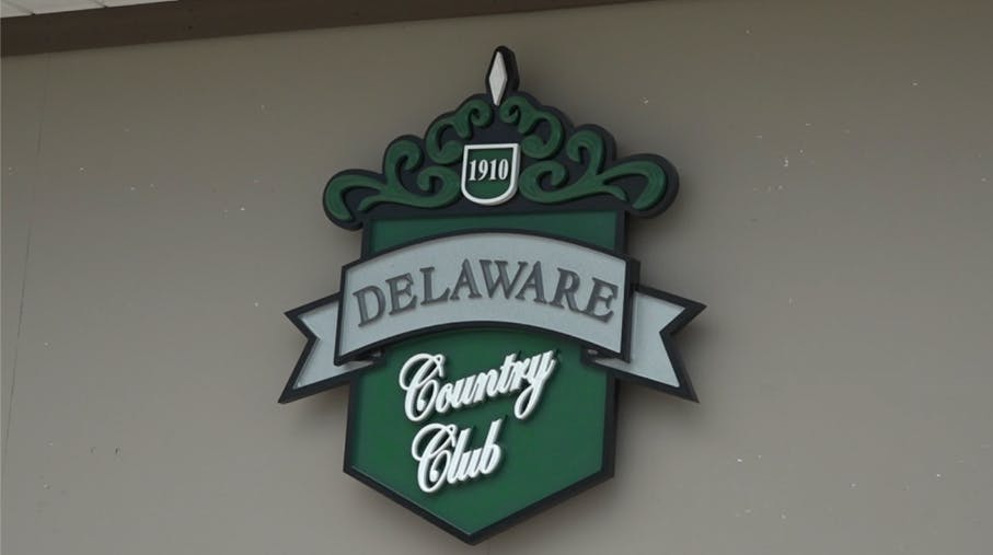 The crest of Delaware Country Club