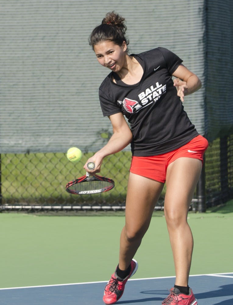 Sophomore Rosalinda Calderon returns a serve during her singles match against Butler for the Fall Dual on Sept. 20 at the Cardinal Creek Tennis Center. DN PHOTO BREANNA DAUGHERTY 