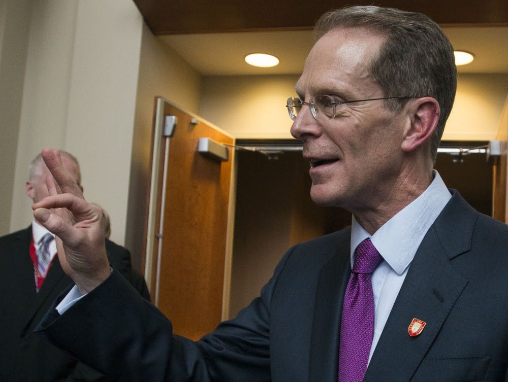 Geoffrey S. Mearns shows to a group of students that he knows how to "chirp" after being announced the 17th president of Ball State. Mearns was announced the next president on Jan. 24 in Sursa Hall and will officially start on August 1. Breanna Daugherty // DN