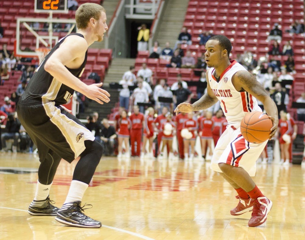 Freshman guard Zavier Turner looks for an open teammate in the second half against Western Michigan on Feb. 26 at Worthen Arena. Turner had a total of 20 points in the game. DN PHOTO BREANNA DAUGHERTY 