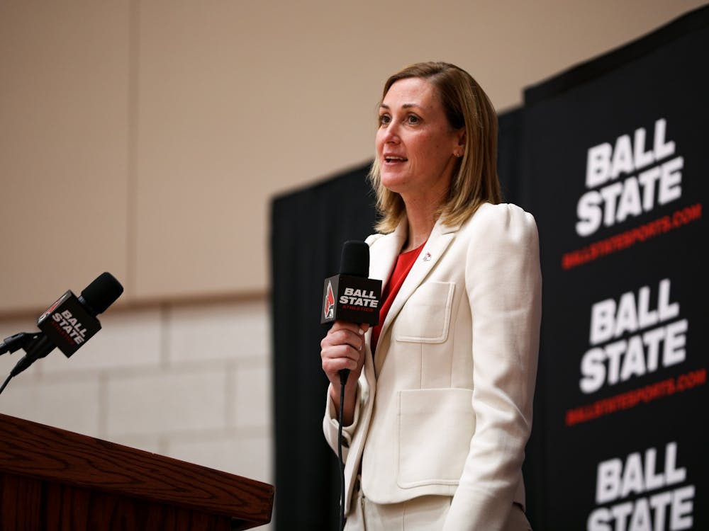 Athletic Director Beth Goetz introduces President Geoffrey Mearns at a press conference held for new men's basketball head coach Michael Lewis Apr. 6 at the Dr. Don Shondell Practice Center. Jacy Bradley, DN