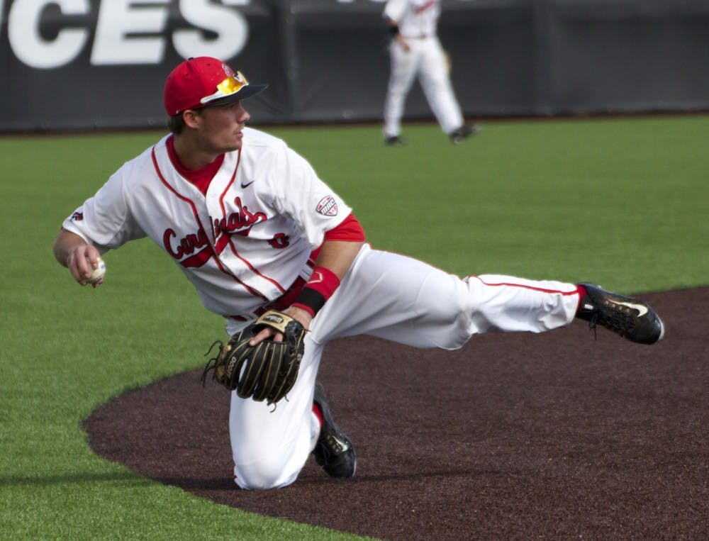 Ball State’s junior infielder Alex Maloney turns to throw the ball to the pitcher during the game against Ohio on April 1. DN PHOTO GRACE RAMEY