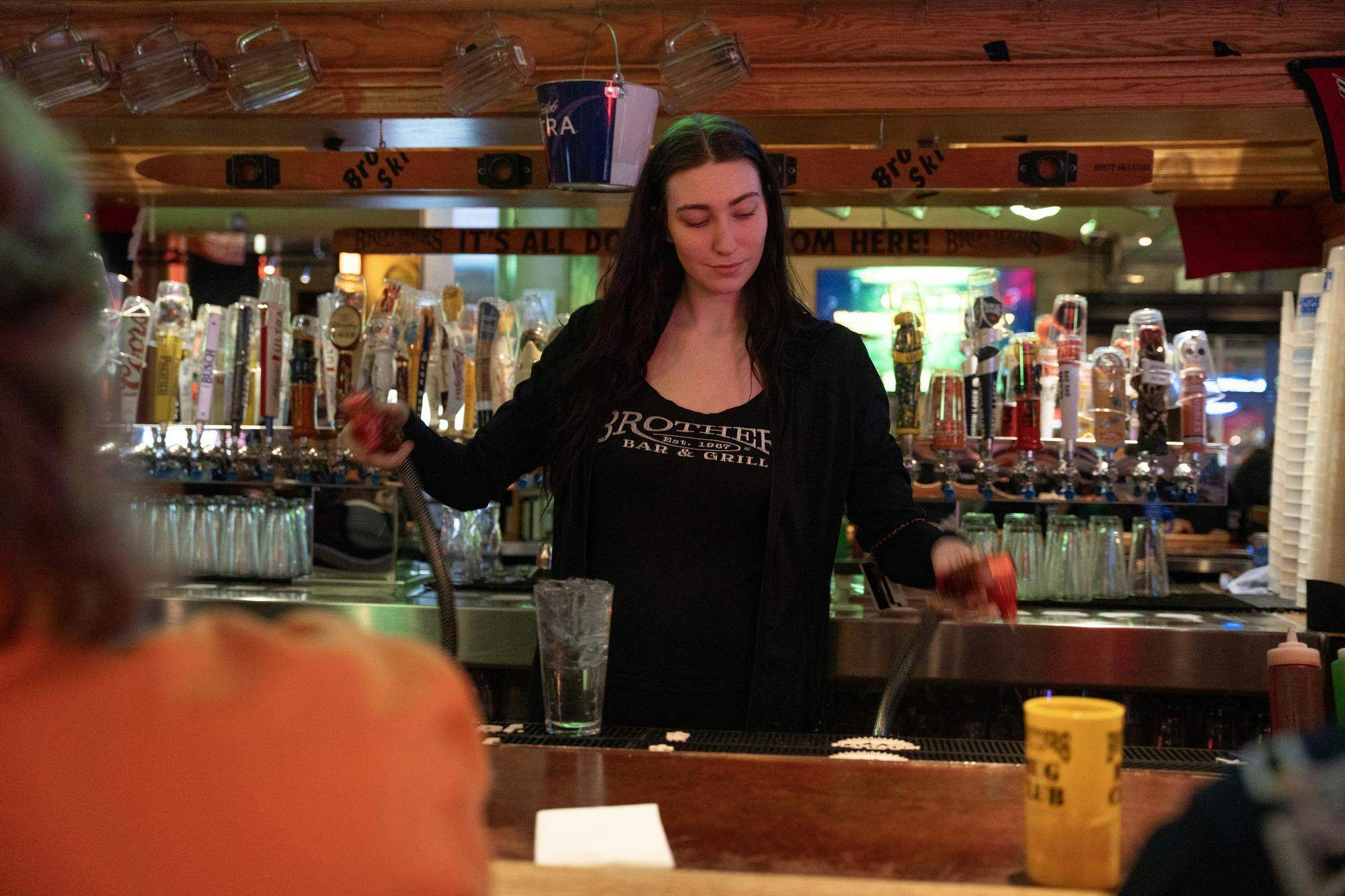 Brothers bartender prepares drinks for Brothers Bar and Grill customers Feb. 3 in Muncie, Indiana. Kyle Ingermann, DN
