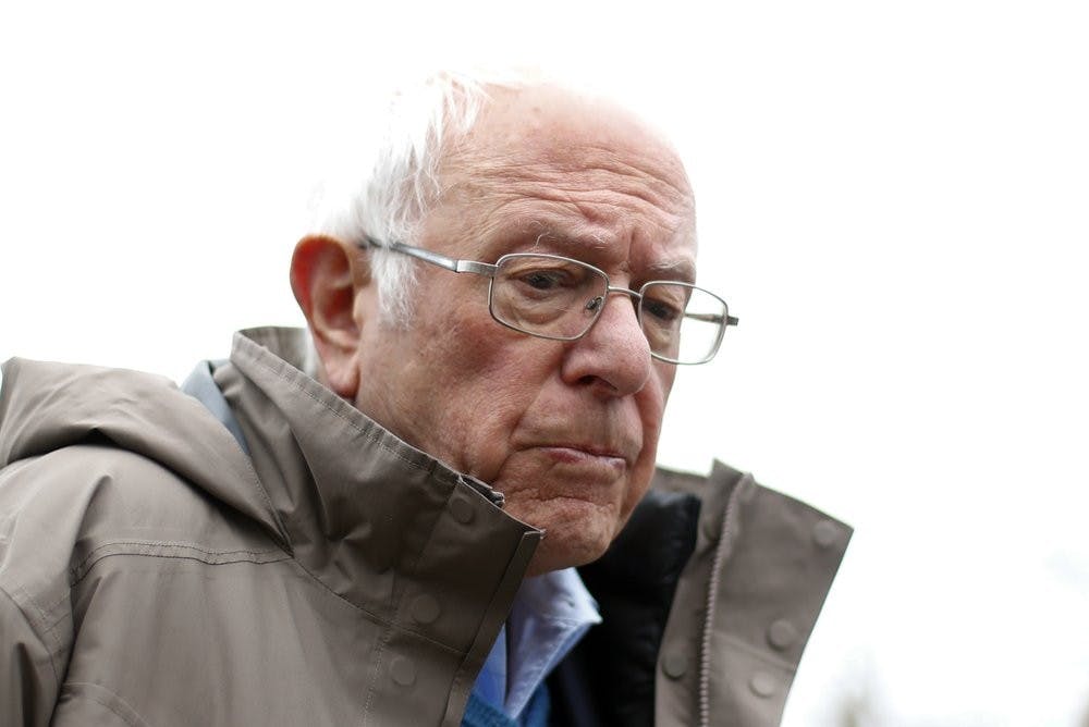 <p>In this March 10, 2020, file photo Democratic presidential candidate Sen. Bernie Sanders, I-Vt., visits outside a polling location at Warren E. Bow Elementary School in Detroit. <strong>AP Photo/Paul Sancya, File</strong></p>