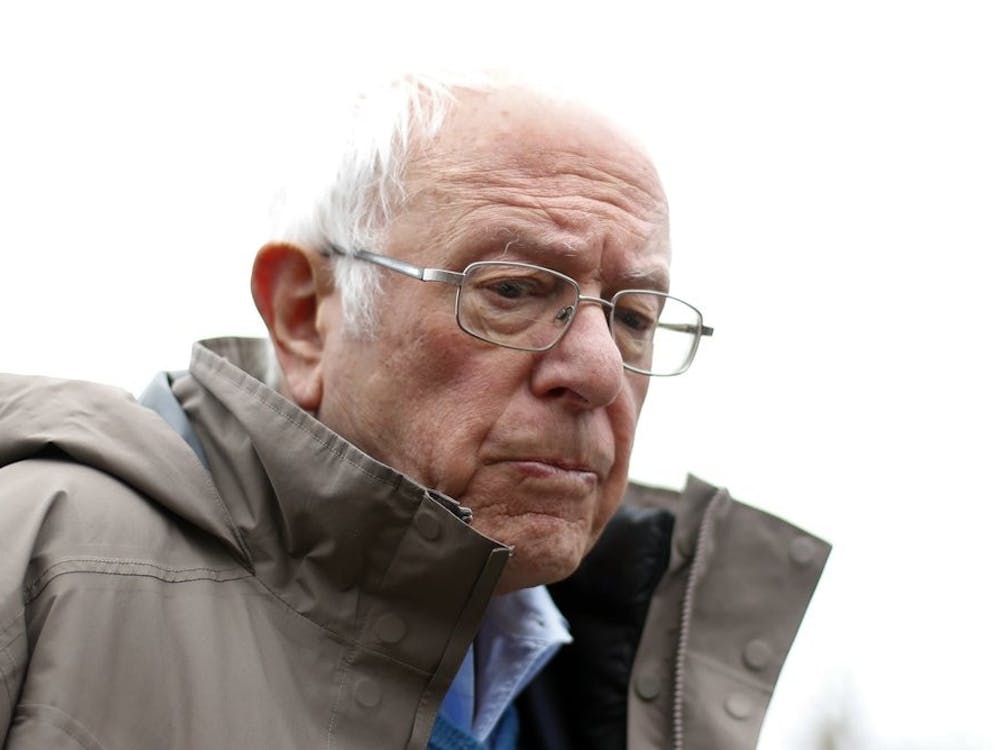 In this March 10, 2020, file photo Democratic presidential candidate Sen. Bernie Sanders, I-Vt., visits outside a polling location at Warren E. Bow Elementary School in Detroit. AP Photo/Paul Sancya, File
