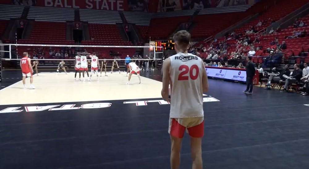 Junior, Patrick Rogers prepares to serve.

Calvin Scott, NewsLink Indiana