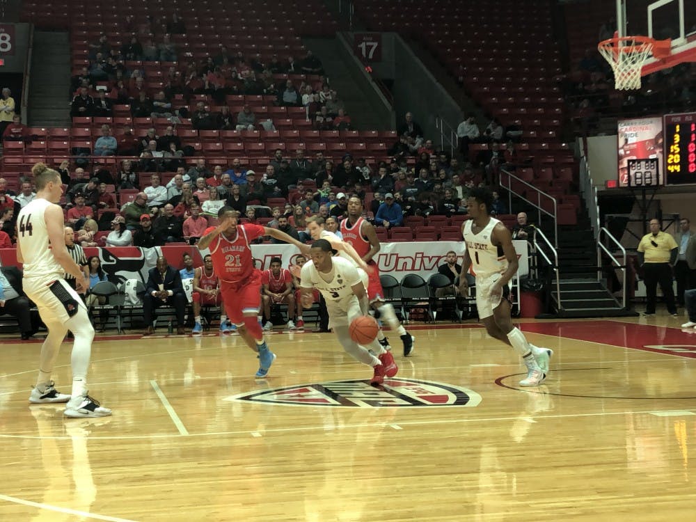 Redshirt junior guard Josh Thompson starts the offensive drive in a game against Delaware State on Dec. 29 at Worthen Arena. The Cardinals won 116-57. Jack Williams,DN