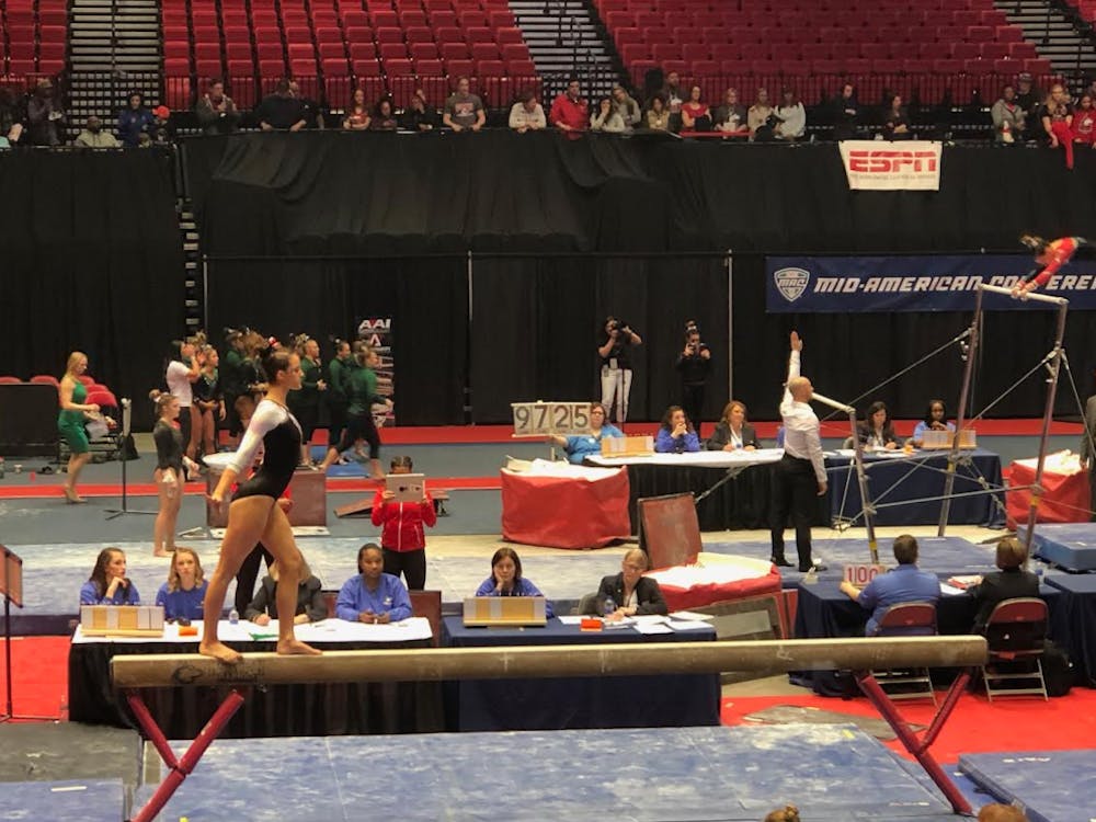 Sophomore Arden Hudson preforms her routine on the beam at the 2019 Gymnastics Mid-American Conference Championship on March 23 at the Convocation Center in DeKalb, Illinois. Ball State took seventh place in the meet. Drew Pierce, DN&nbsp;