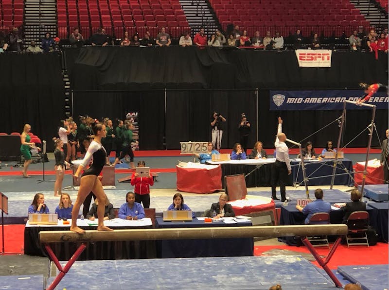 Sophomore Arden Hudson preforms her routine on the beam at the 2019 Gymnastics Mid-American Conference Championship on March 23 at the Convocation Center in DeKalb, Illinois. Ball State took seventh place in the meet. Drew Pierce, DN&nbsp;