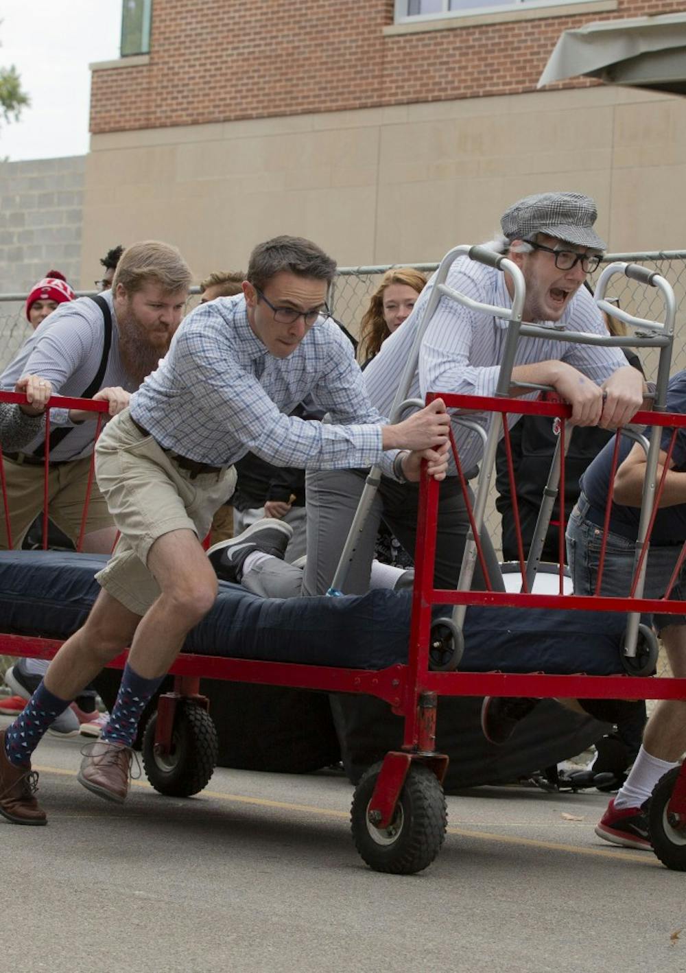  Ball State University students compete in the annual homecoming Bed Race Oct. 19, 2018, on Riverside Ave. The Bed Race is held as a part of Ball States homecoming festivities. Jacob Haberstroh,DN.
