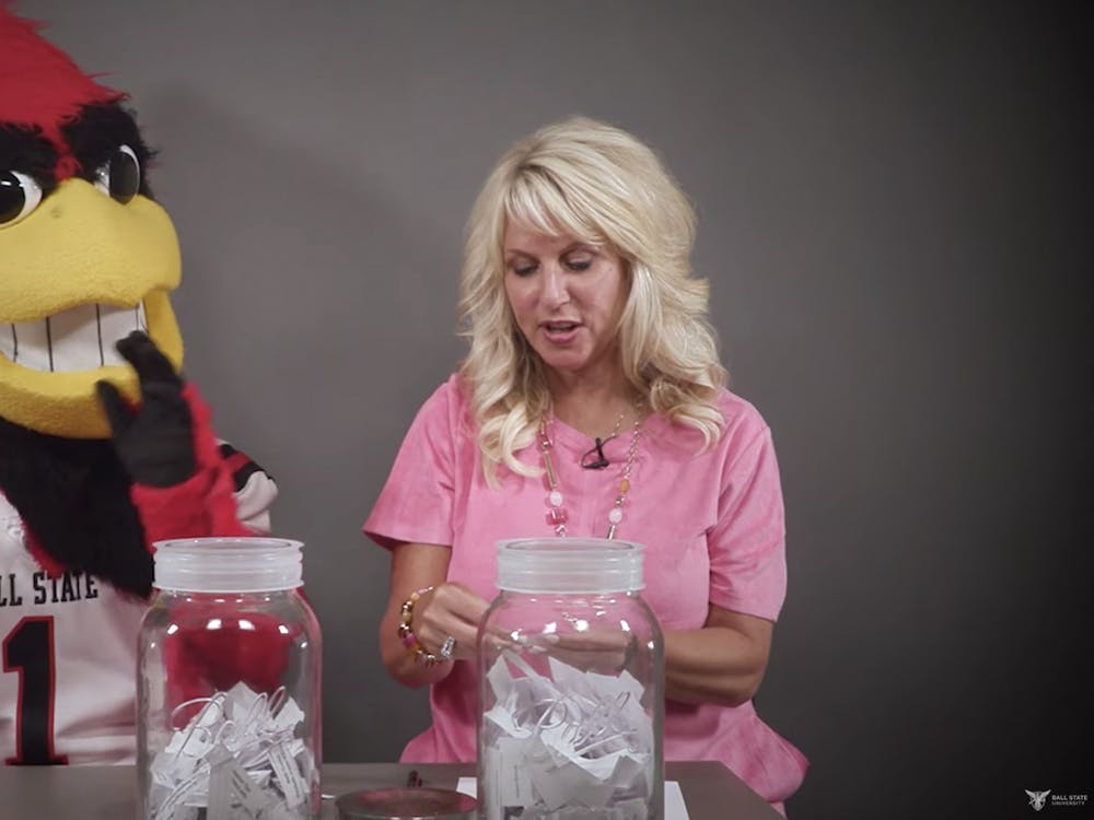 Charlie Cardinal claps for student winners of vaccine incentive prizes announced by Kathy Wolf, vice president for marketing and communications, July 14, 2021. Each Wednesday at noon, through Sept. 8, university staff will announce new winners of incentive prizes. Ball State University YouTube page, Screenshot Capture