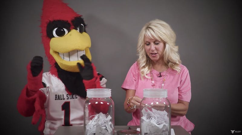 Charlie Cardinal claps for student winners of vaccine incentive prizes announced by Kathy Wolf, vice president for marketing and communications, July 14, 2021. Each Wednesday at noon, through Sept. 8, university staff will announce new winners of incentive prizes. Ball State University YouTube page, Screenshot Capture