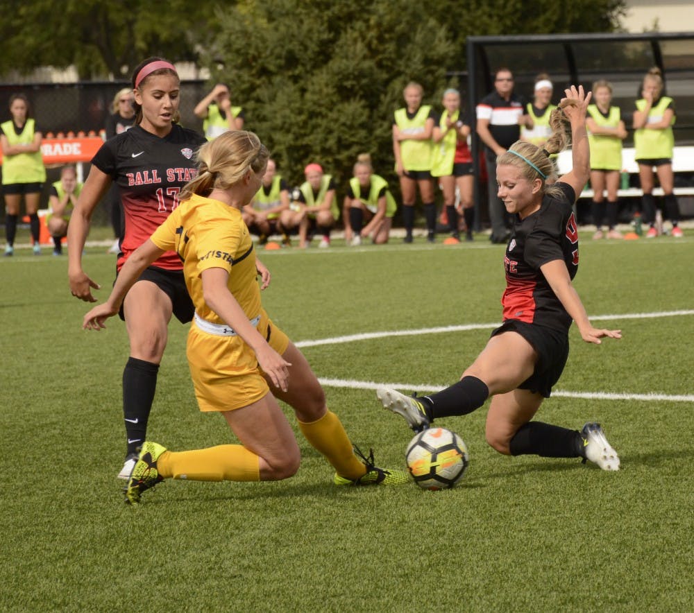 <p>Kent State sophomore and defensive player Amanda Reed, faces off against Ball State University senior, foward/midfielder Allison Abbe Oct. 1, 2017 at Briner Sports Complex. Harrison Raft, DN</p>