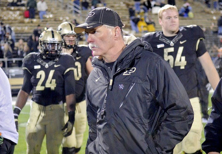 Purdue head coach Danny Hope walks off the field after his team’s loss to Penn State during a football game Nov. 3, 2012, at Ross-Ade Stadium in West Lafayette, Ind. Hope was fired as head coach of Purdue’s football program as of Sunday. MCT PHOTO