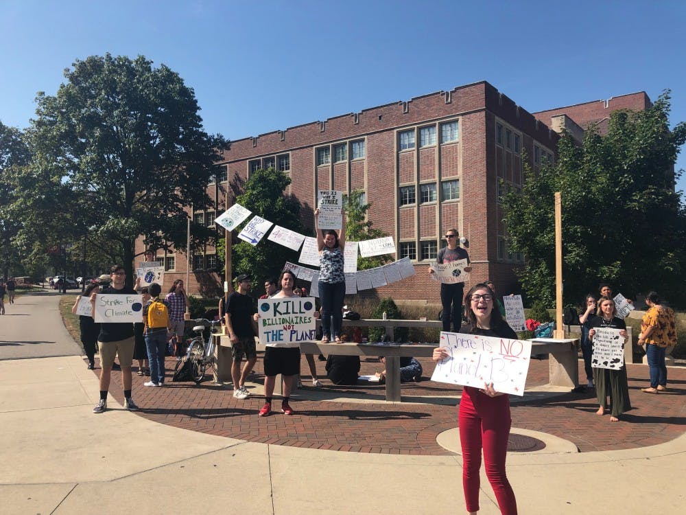 <p>Students took turns throughout the eight hour demonstration to show their support for the climate. On Friday Sept. 21, Ball State students hosted a climate rally at the scramble, as part of a world wide protest. <strong>Chase Martin, DN.</strong></p>