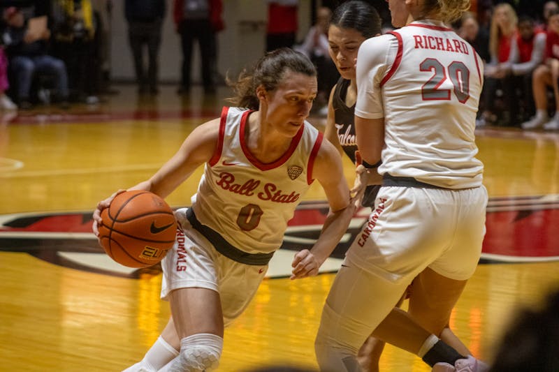 Senior Ally Becki drives the ball against Bowling Green Feb. 5th at Worthen Arena. Becki had 17 points in the game. Jayce Blane, DN