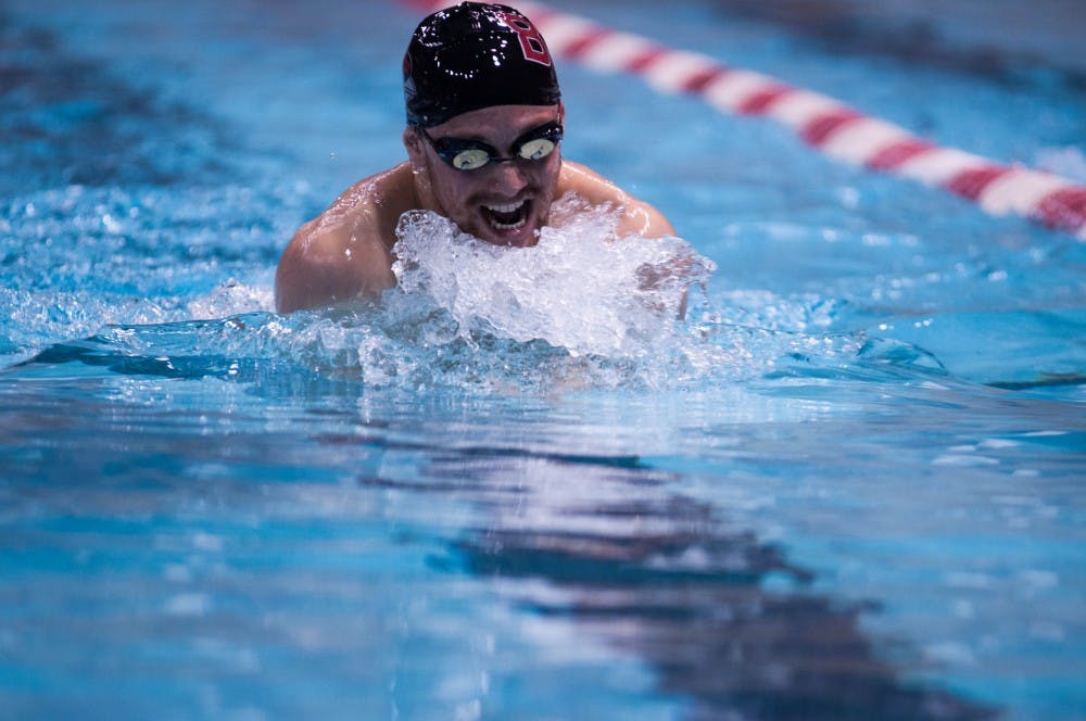 Senior Tucker Hale swims the men's 200-yard individual melody event at the 10th Doug Coers Invitational at the Lewellen Aquatic Center. DN PHOTO KATIE GRAY