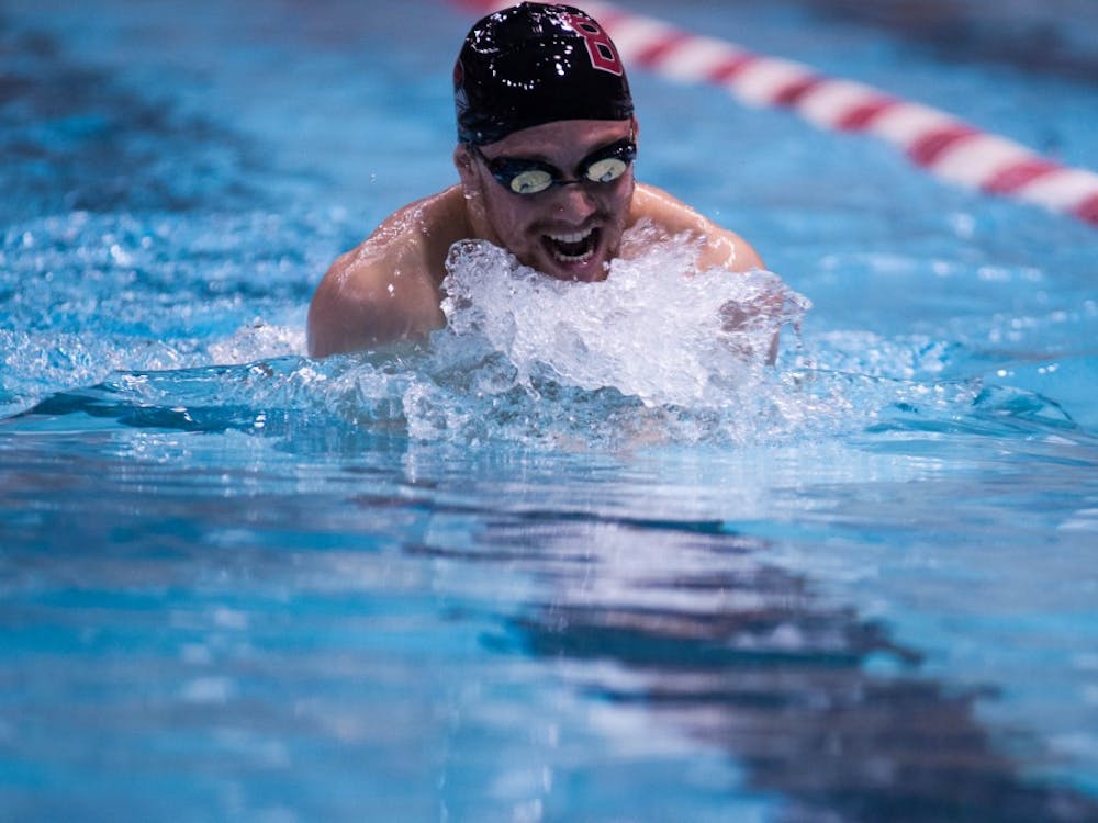 Senior Tucker Hale swims the men's 200-yard individual melody event at the 10th Doug Coers Invitational at the Lewellen Aquatic Center. DN PHOTO KATIE GRAY