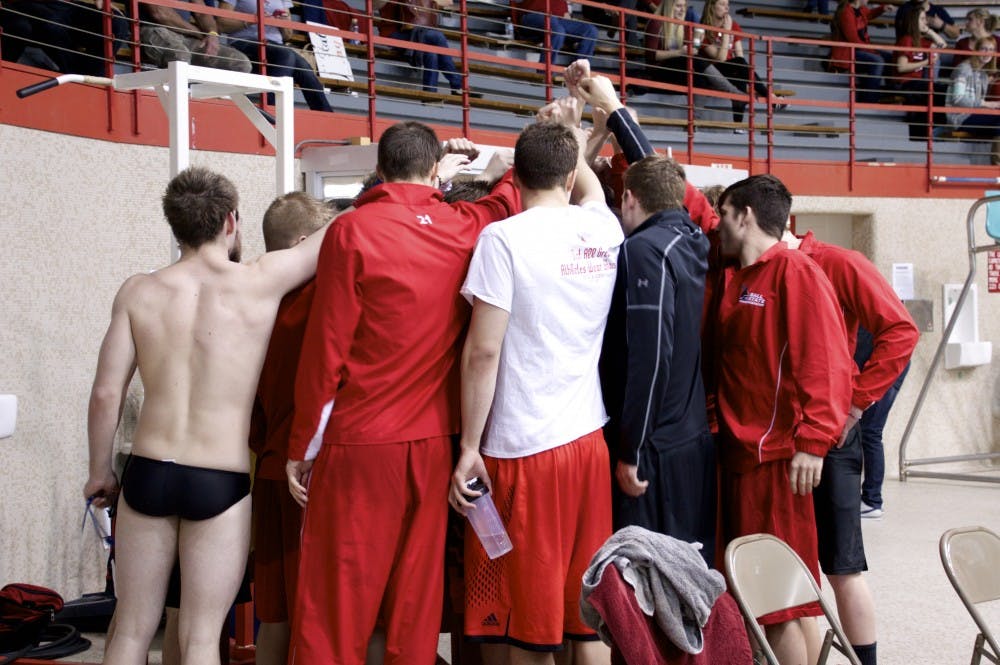 <p>The Ball State Men's Swim and Dive team prepares gets ready before&nbsp;the swim and dive meet against IUPUI and the University of Milwaukee on Jan. 23 at Lewellen Pool. DN PHOTO ALAINA JAYE HALSEY</p>