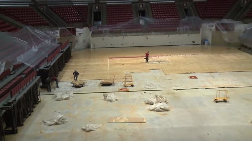 Worthen Arena is getting new flooring over the summer. Workers started tearing up the floor piece by piece, all the way down to the concrete. PHOTO COURTESY OF BALL STATE ATHLETICS