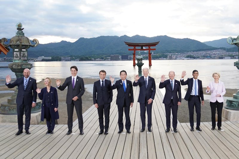 (L-R) European Council President Charles Michel, Italy&apos;s Primer Minister Giorgia Meloni, Canada&apos;s Prime Minister Justin Trudeau, France&apos;s President Emmanuel Macron, Japan&apos;s Prime Minister Fumio Kishida, US President Joe Biden, German Chancellor Olaf Scholz, Britain&apos;s Prime Minister Rishi Sunak and European Commission President Ursula von der Leyen pose for the family photo during a visit to the Itsukushima Shrine in Miyajima Island as part of the G7 Leaders&apos; Summit, on May 19, 2023. (Stefan Rousseau/POOL/AFP via Getty Images/TNS)