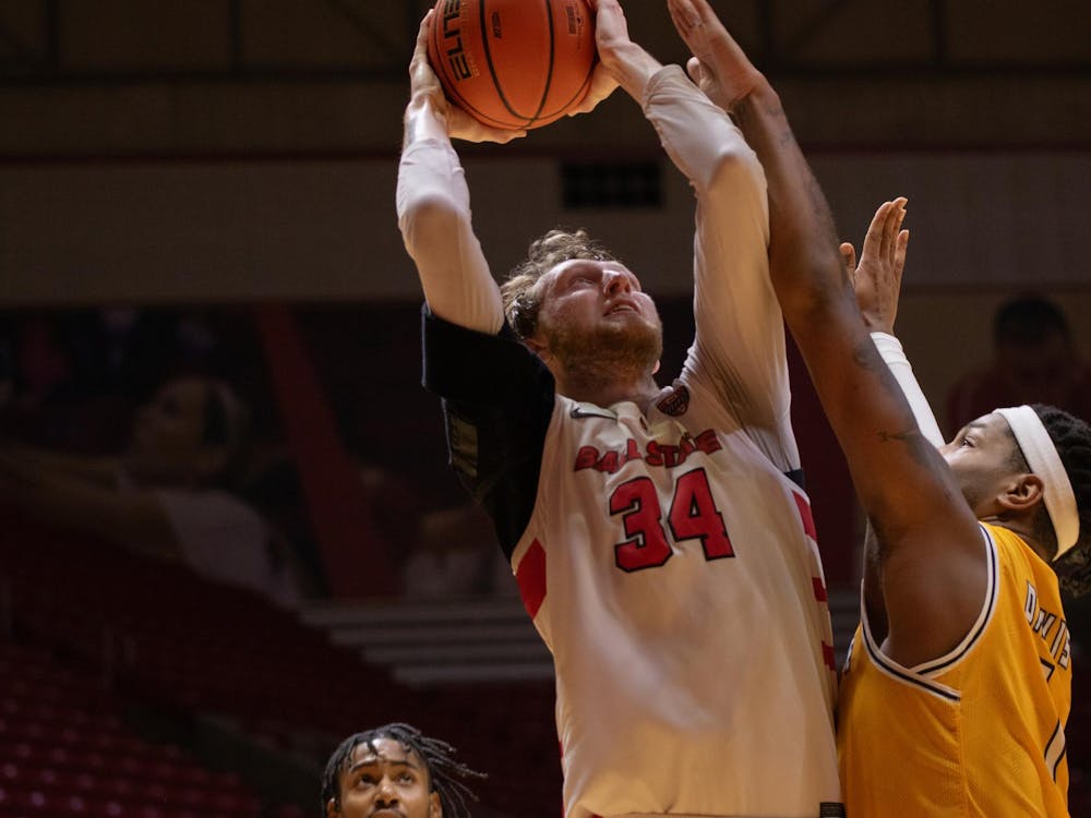 Junior center Ben Hendricks puts the ball up for two against Kent State Mar. 5 at Worthen Arena. Hendricks scored 11 points in the game. Kate Tilbury, DN