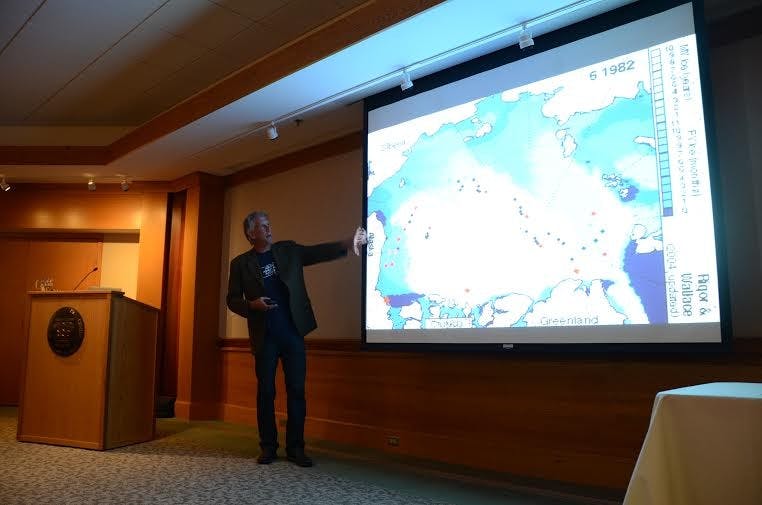 Jim Poyser, executive director of Earth Charter  Indiana and keynote speaker for the Living Lightly Fair, gives a brief  explanation of climate change. Poyser spends his time  traveling from school to school around Indiana and neighboring states  educating youth on climate change. DN PHOTO ALAN HOVORKA