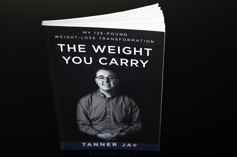 &quot;The Weight You Carry&quot; by Tanner Jay, a 2020 graduate of Ball State University, was released in July 2020. Jay raised more than $5000 for the book through his IndieGoGo campaign. Jacob Musselman, DN Illustration