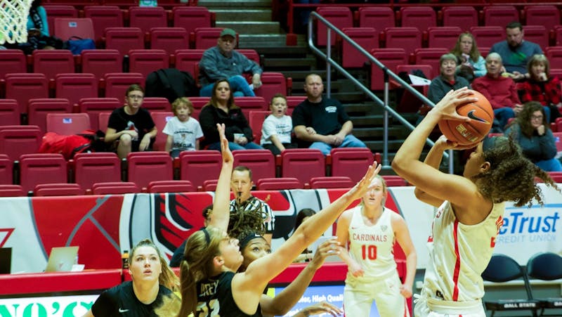 Junior Forward, Oshlynn Brown(32) , fades away on a two point attempt against Butler on Nov. 23, 2019 at John E. Worthen Arena. Brown finished the game with 10 points in a 74-70 win. Omari Smith, DN