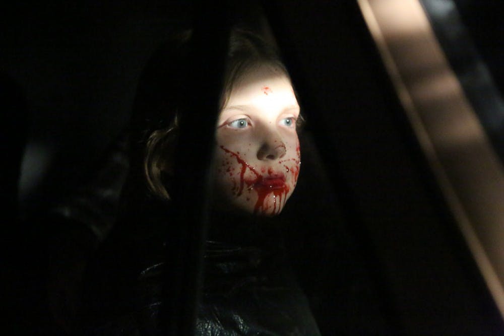 Nadia Fancher, 9, has her face covered with fake blood during the filming of "Popsy." Ball State alumnus and director Jac Kessler said he cast Nadia because of her ability to take direction and their mutual love for Alice Cooper and horror. Jac Kessler, Photo Provided