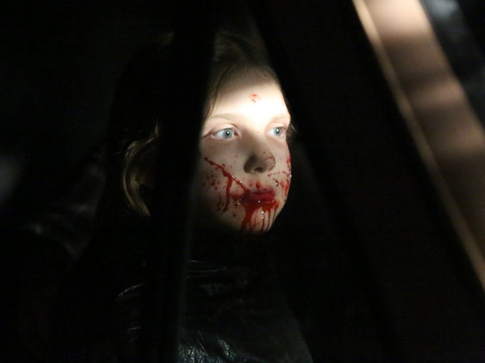 Nadia Fancher, 9, has her face covered with fake blood during the filming of "Popsy." Ball State alumnus and director Jac Kessler said he cast Nadia because of her ability to take direction and their mutual love for Alice Cooper and horror. Jac Kessler, Photo Provided