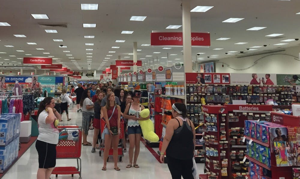 <p>Students stand in line to pay at Target Aug. 20 during Ball State's exclusive shopping event. The university bussed students in for free. <em>DN PHOTO CASEY SMITH</em></p>