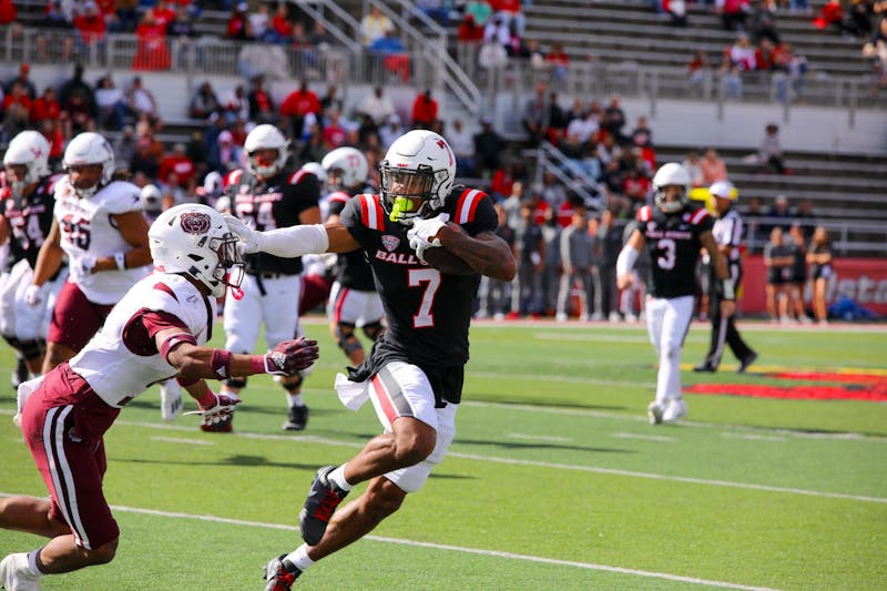 Sophomore wide receiver Cam Pickett run the ball of attempted touchdown against Missouri State Sept. 7 at Scheumann Stadium. Pickett saw no action last season. Isabella Kemper, DN