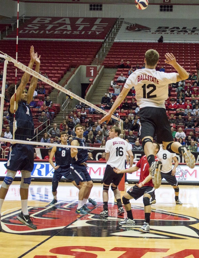 Senior Matt Sutherland hits the ball over the net during the game against Penn State on Jan. 16 at Worthen Arena. DN PHOTO ALAINA JAYE HALSEY