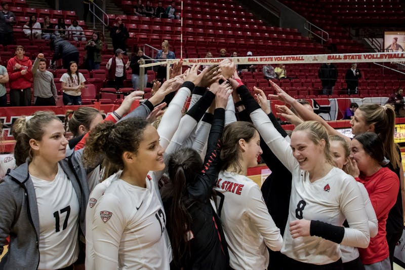 Ball State women's volleyball huddles after defeating Central Michigan in the last game of the regular season Nov. 16, 2019, in John E. Worthen Arena. The Cardinals are 17-11 for the season going into the MAC championship. Eric Pritchett, DN