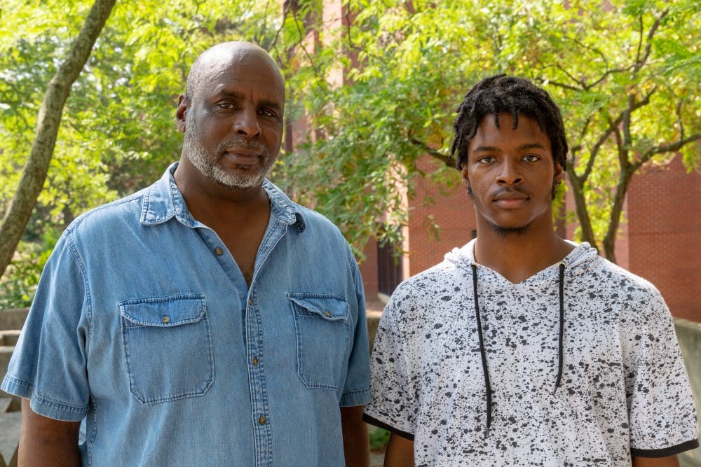 <p>Associate professor of architecture Olon Dotson and his son Lyle Dotson on Ball State University's campus Monday, Aug. 27, 2018, in Muncie. <strong>Kyle Crawford, DN</strong></p>