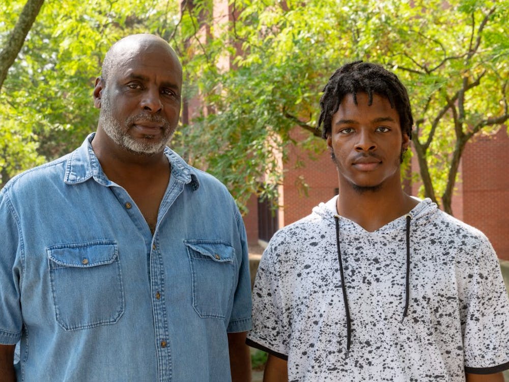 Associate professor of architecture Olon Dotson and his son Lyle Dotson on Ball State University's campus Monday, Aug. 27, 2018, in Muncie. Kyle Crawford, DN