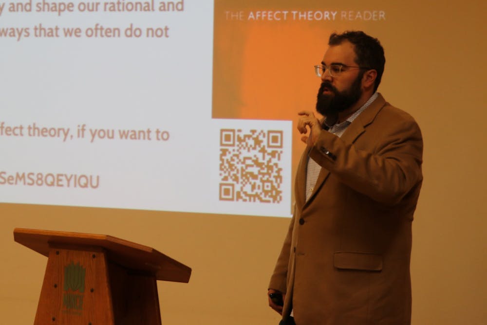<p>Dr. Matthew R. Hotham, an assistant professor of religious studies, speaks at the Muncie Kennedy Library Branch in the program &quot;Big Questions, Big Ideas.&quot; Hotham spoke about dogs and Islamophobia in Europe and North America. <strong>Elijah Poe, DN</strong></p>