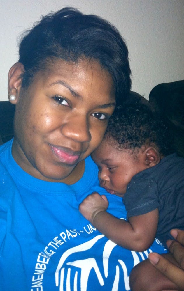 Journalism graphics major Autumn Ricketts and her son pose for a photo. Rather than stopping their education, some female students elect to continue even with children. PHOTO PROVIDED BY AUTUMN RICKETTS