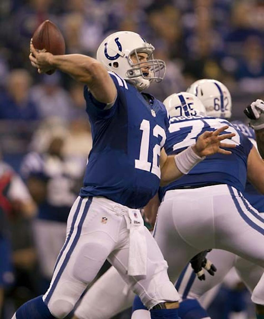 Colts quarterback Andrew Luck throws a pass in the third quarter on Nov. 4 in Lucas Oil Stadium as the Indianapolis Colts defeated the Miami Dolphins 23-20. The Colts lost to the Patriots 59-24 during Sunday’s game. MCT PHOTO