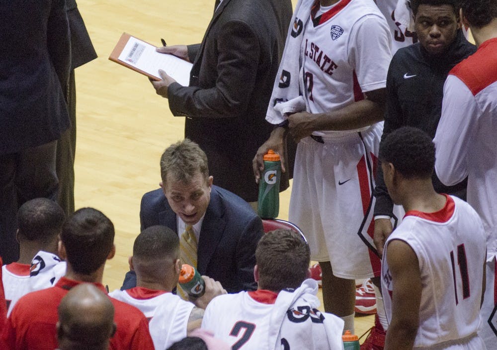 Head coach James Whitford talks to his player during a timeout at the game against Central Michigan on Jan. 10 at Worthen Arena. DN PHOTO BREANNA DAUGHERTY
