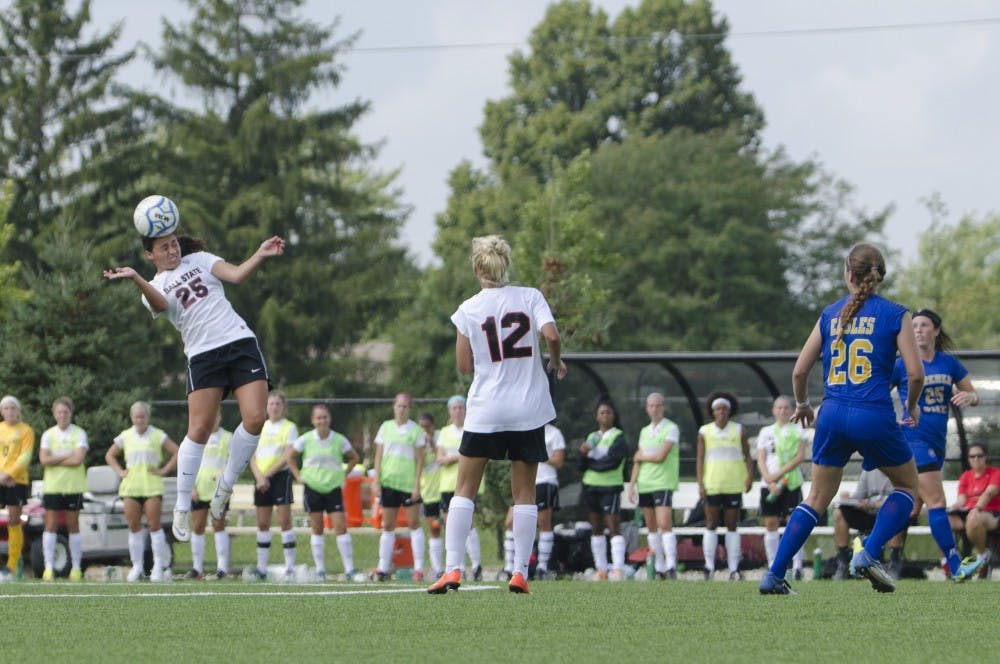 Junior midfielder Elaina Musleh head bumps the ball during the soccer game against Moorehead State on Aug. 31 at the Briner Sports Complex. DN PHOTO BREANNA DAUGHERTY 