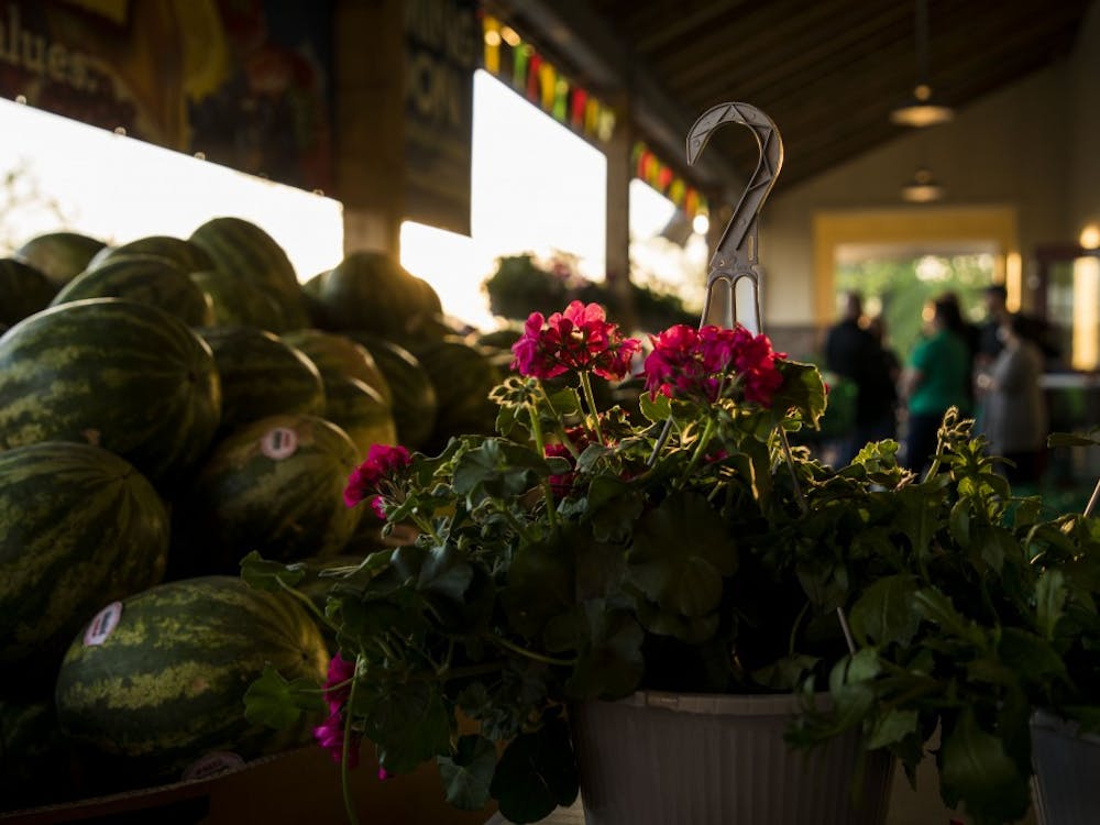 People lined up at 6:45 a.m. Thursday, May 17, for the grand opening of the new Fresh Thyme market on McGalliard Road. People were able to fill their carts with produce, prizes and other goods. Rachel Ellis, DN 