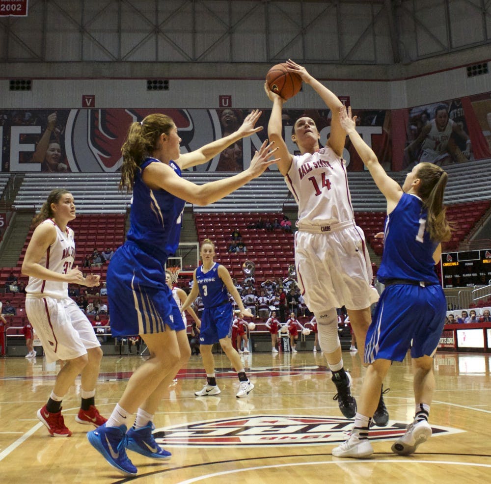 Junior center for the Ball State Cardinals Renee Bennett attempts to score a shot during the game against Buffalo on Jan. 13 in Worthen Arena. DN PHOTO GRACE RAMEY