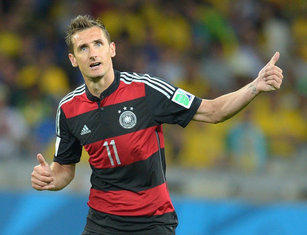 Miroslav Klose of Germany celebrates amid a 7-1 win against Brazil in a FIFA World Cup 2014 semifinal at Estadio Mineirao in Belo Horizonte, Brazil, on Tuesday, July 8, 2014. Klose's first-half goal gives him the most goals scored (16) in World Cup history. (Thomas Eisenhuth/DPA/Zuma Press)
