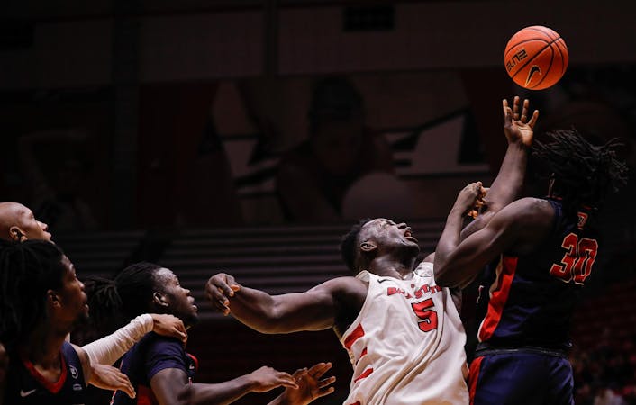 Senior center Payton Sparks reaches for a rebound against Detroit Mercy Nov. 20 at Worthen Arena. Sparks had seven rebounds in the game. Andrew Berger, DN